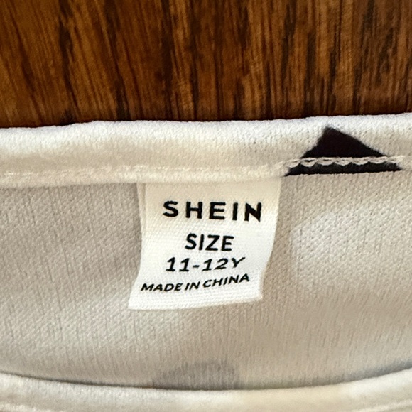 SHEIN White Top with Black Heart Accents - Picture 2 of 3